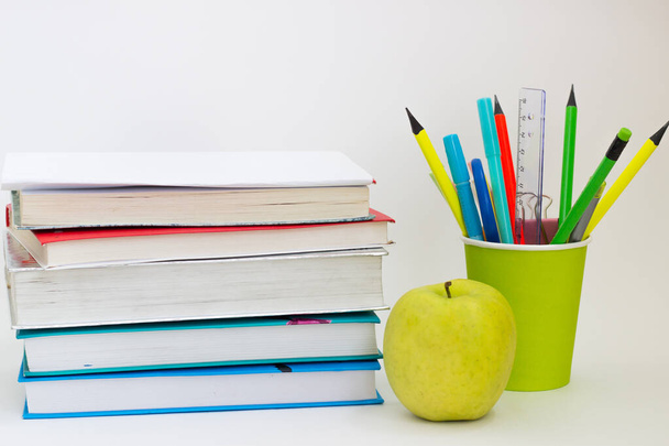 school books pencils on a white background - Фото, изображение