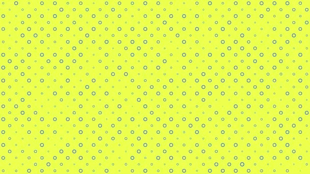 Μπλε κύκλοι σε κίτρινο φόντο αλλάζουν μέγεθος με κορυφαία κίνηση προβολής - Πλάνα, βίντεο
