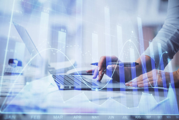 Double exposure of woman hands typing on computer and forex chart hologram drawing. Stock market invest concept. - Foto, Bild