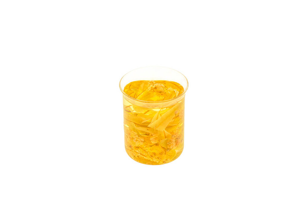 Therapeutic medicinal tincture of dried linden in a glass on a white background - Φωτογραφία, εικόνα