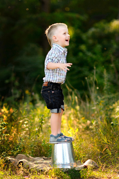 portrait of little stylish boy outdoors - Foto, imagen