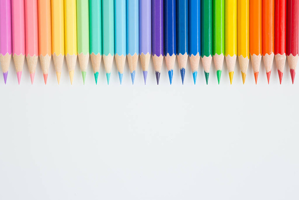 Pattern of Colorful Many colored pencils on a white background and copy space - Foto, imagen