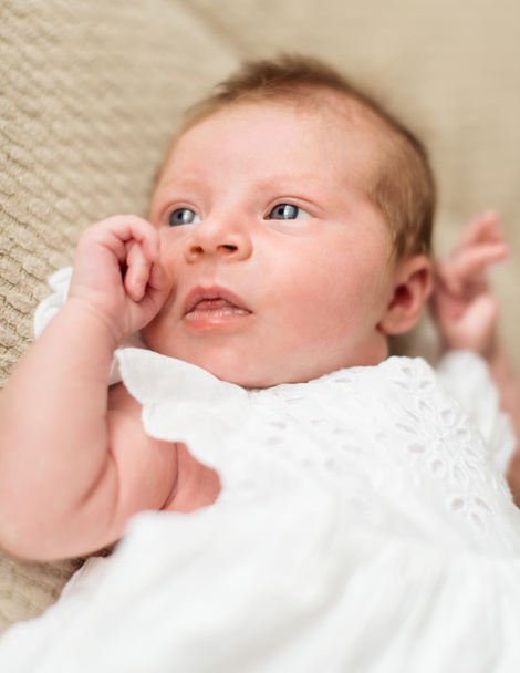 Newborn girl with opened eyes - Фото, изображение