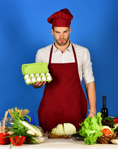 Cuisine and professional cooking concept. Man in cook uniform - 写真・画像