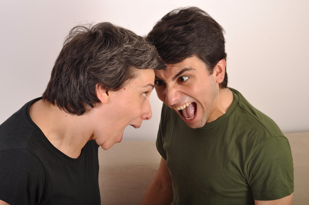 Woman and man yelling face to face - Foto, Bild