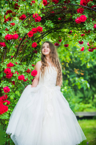Wedding day is here. bridesmaid. childhood happiness. girls party dress. female fashion salon. little beauty in blossoming garden. park jasmine flower. beautiful prom queen. look as princess - Foto, immagini
