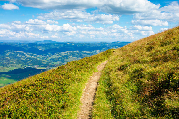 travers path through mountain range. grass on the hills and steep slopes. summer landscape on a sunny day.  - Foto, Bild