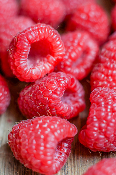 Closeup of fresh picked raspberries - 写真・画像