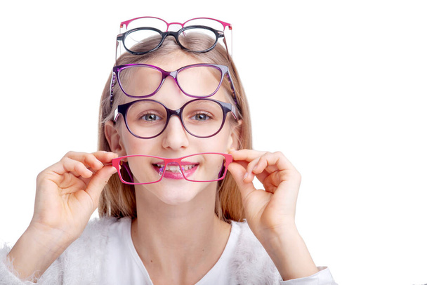 girl teenager in glasses for vision in the studio - Foto, Imagem