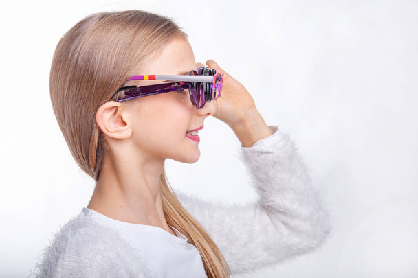 girl teenager in glasses for vision in the studio - Φωτογραφία, εικόνα