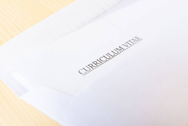 Curriculum vitae in an envelope; send and receive a vurriculum vitae - Photo, Image