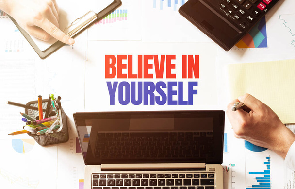 believe in yourself Business team hands at work with financial documents - Zdjęcie, obraz
