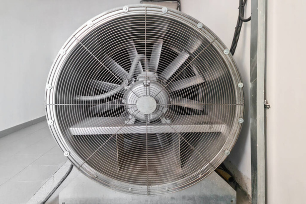 Large fan for ventilation. Industrial air conditioning and ventilation systems on a roof. Closeup industrial ventilation fan - Photo, Image