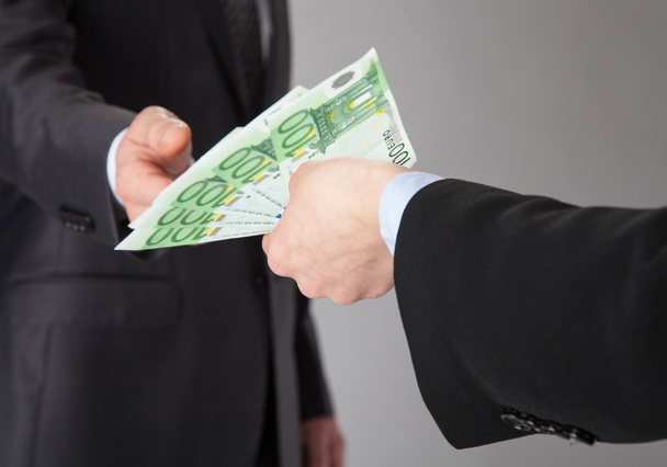 Businessman accepting money offer - Фото, изображение