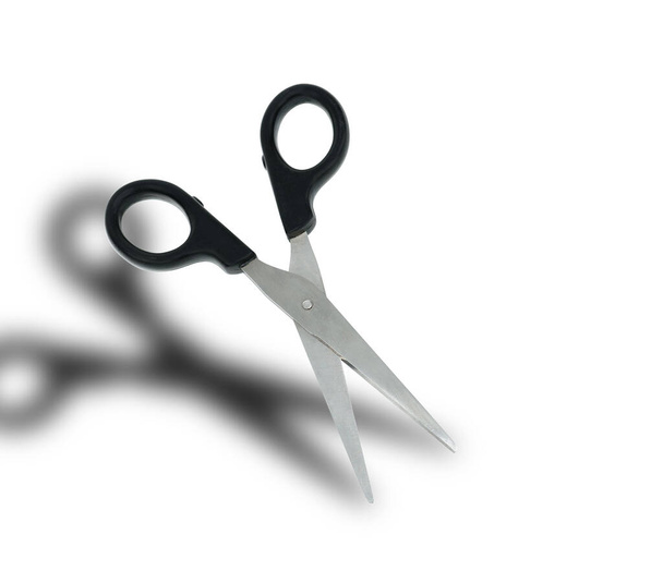 scissors with black pen and shadow on a white background in isolation - Photo, Image
