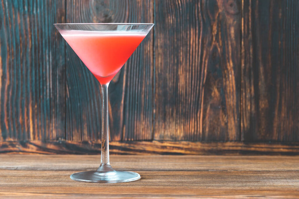 Glass of Clover Club Cocktail on wooden background - Фото, изображение