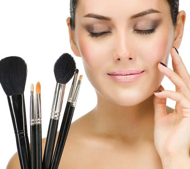Woman with make up brushes - Foto, Imagem