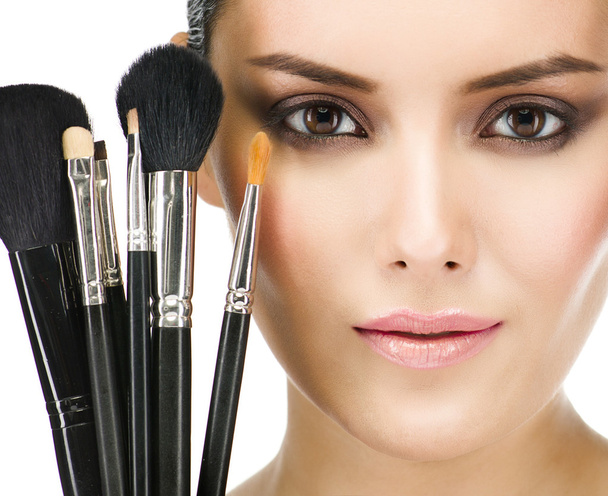 Woman with make up brushes - Φωτογραφία, εικόνα