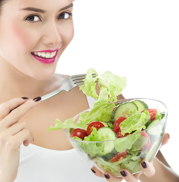 Woman is eating salat - Foto, Imagem