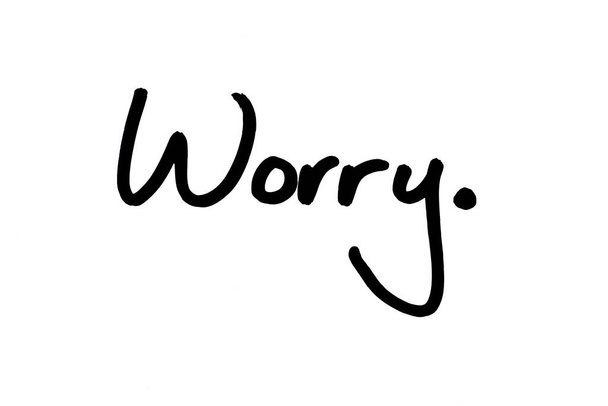 The word Worry handwritten on a white background. - Fotografie, Obrázek