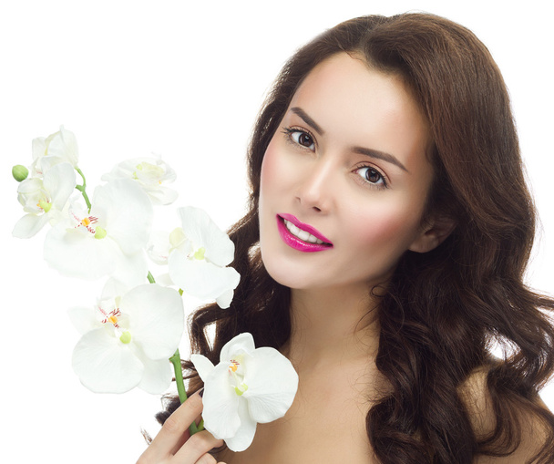 Woman with orchids flower - Photo, image