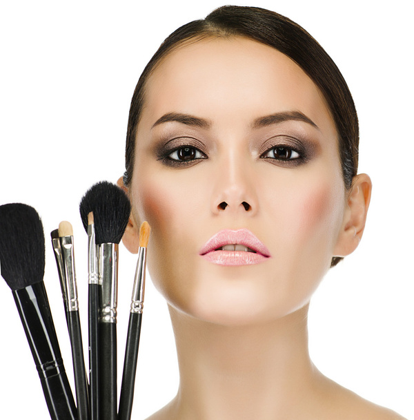 Woman with make up brushes - Foto, Bild