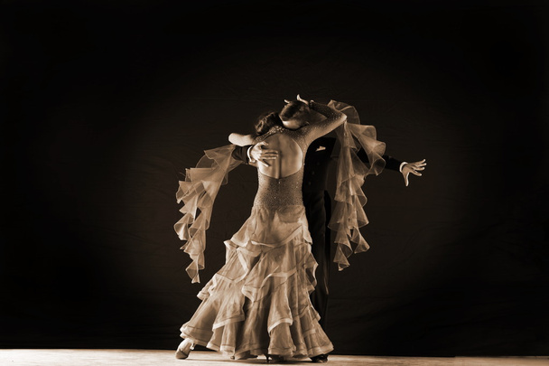 dancers in ballroom against on black background - Photo, Image