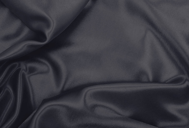 Smooth elegant dark grey silk or satin texture can use as abstract background. Luxurious background design - Φωτογραφία, εικόνα