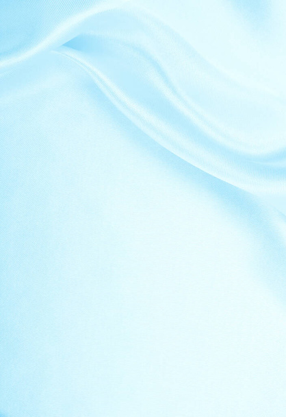 Smooth elegant blue silk or satin luxury cloth texture can use as abstract background. Luxurious background design - Foto, immagini