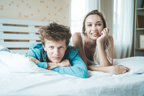 Happy Couple Playing together in the bedroom - Фото, зображення