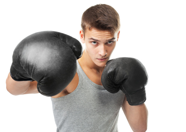 Boxer throwing a punch - Foto, Bild