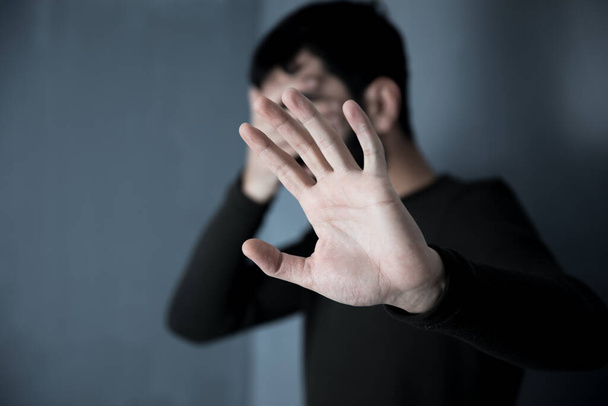 man hand in face and stop sig - Foto, afbeelding