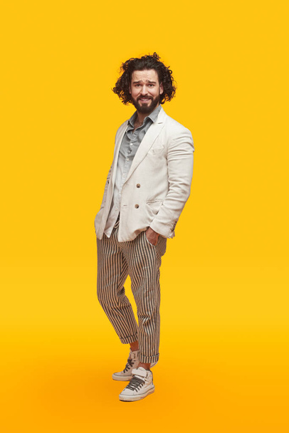 Relaxed bearded guy in stylish outfit - Photo, Image