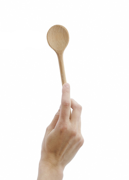 Wooden spoon in hand - Foto, immagini