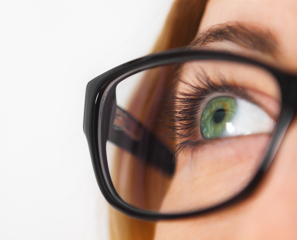 Close up of woman wearing black eye glasses - Foto, Imagen