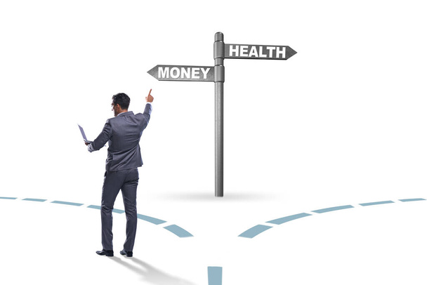 Бизнесмен выбирает между деньгами и здоровьем
 - Фото, изображение