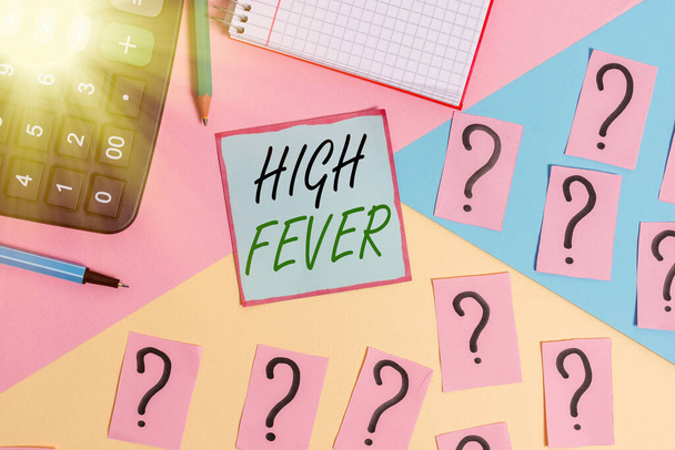 Conceptual hand writing showing High Fever. Business photo showcasing medical condition which the body temperature higher than usual Mathematics stuff and writing equipment on pastel background. - Photo, Image