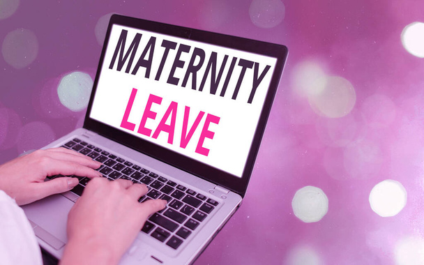 Conceptual hand writing showing Maternity Leave. Business photo showcasing a leave of absence for an expectant or a new mother Modern gadgets white screen under colorful bokeh background. - Photo, Image