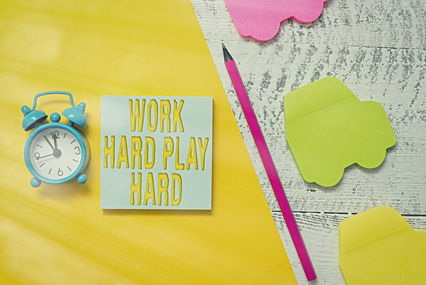 Text sign showing Work Hard Play Hard. Conceptual photo diligent in any activity Party at weekends Hardworking Notepad car sticky notes pen paper sheet alarm clock wooden background. - Photo, Image