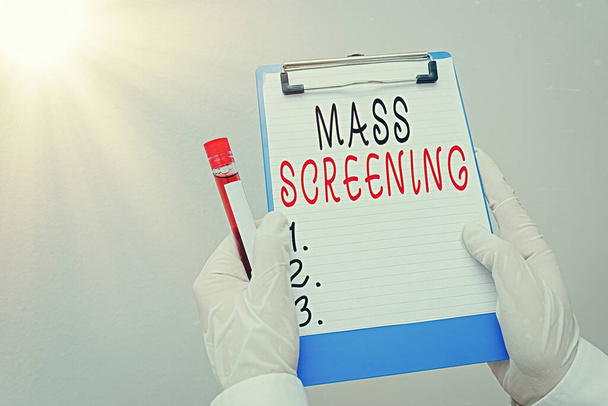 Texte manuscrit Mass Screening. Concept, c'est-à-dire évaluation de la santé réalisée sur une grande partie de la population.. - Photo, image