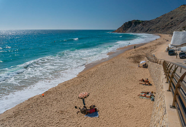 Beach in the fishing village of Burgau in the Algarve, Portugal - Photo, Image