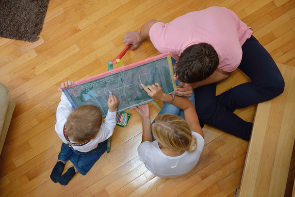 family drawing on school board at home - 写真・画像