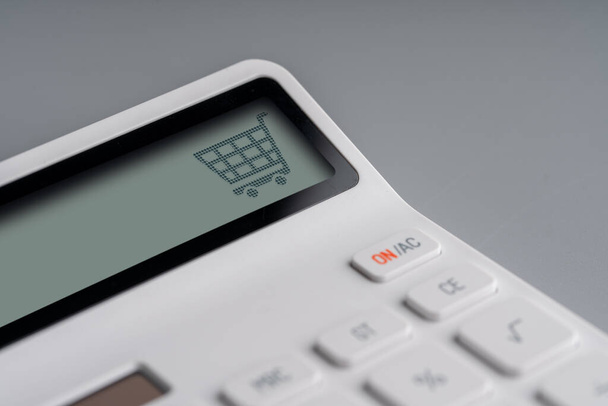 Online shopping & business icon on white calculator - Foto, afbeelding