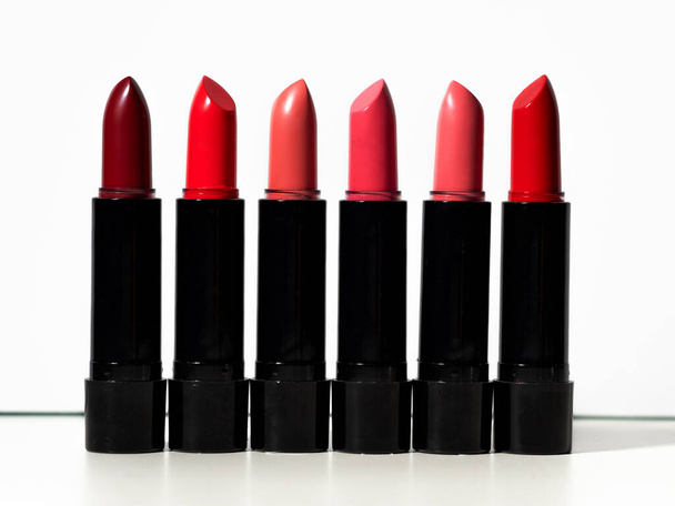 set of six multi-colored lipsticks or lip glosses. set of makeup artist, - 写真・画像