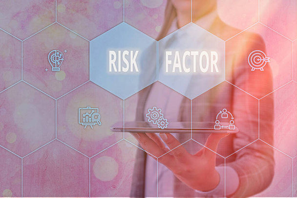 Handwriting text Risk Factor. Concept meaning Characteristic that may increase the percentage of acquiring a disease Grids and different set up of the icons latest digital technology concept. - Photo, Image