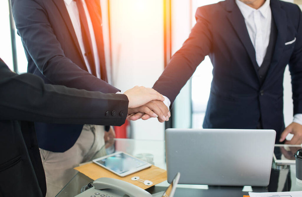 Business shaking hands after making agreement in office - Fotoğraf, Görsel