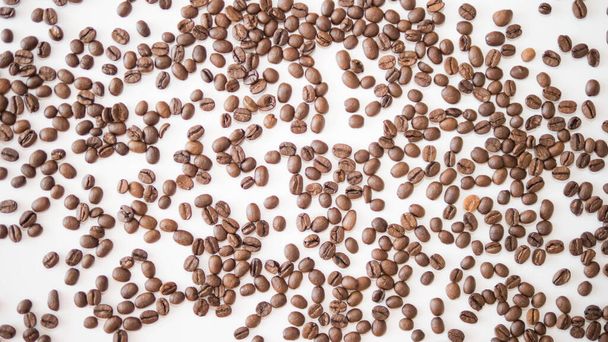 Coffee on a white background,top view, roasted grains - Fotografie, Obrázek
