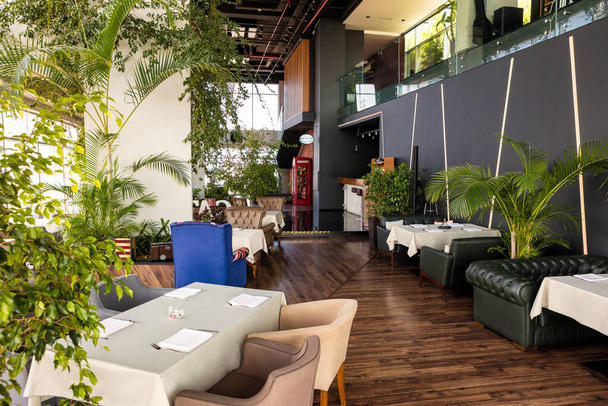 Beautiful restaurant interior with plants - Photo, Image