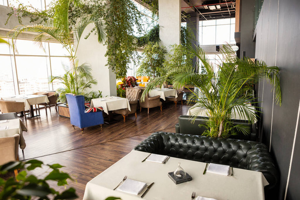 Beautiful restaurant interior with plants - Photo, image
