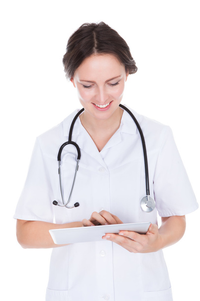 Female Doctor Using Digital Tablet - Фото, зображення